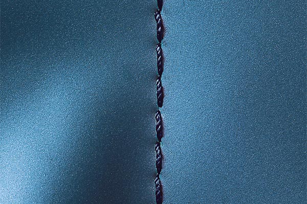 Point de couture avec une aiguille Shmetz DBX1 SPI 