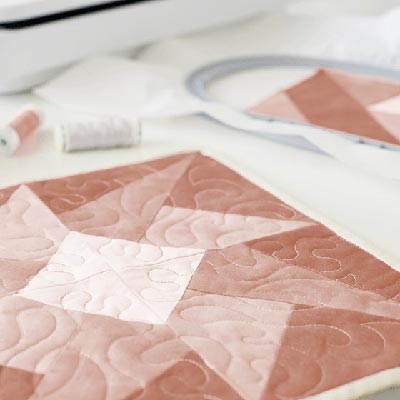 Quilter dans le cadre - Bernina 770 QE PLUS