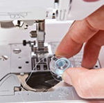 Machine à coudre Brother Innovis 1100 - Remplissage de canette
