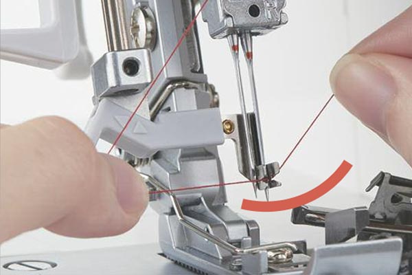 Enfilage automatique des aiguilles