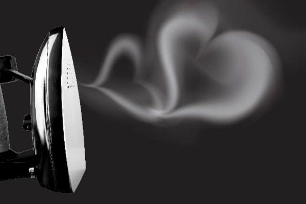 Repassage vertical de la centrale vapeur Michelini Prestige Elegance