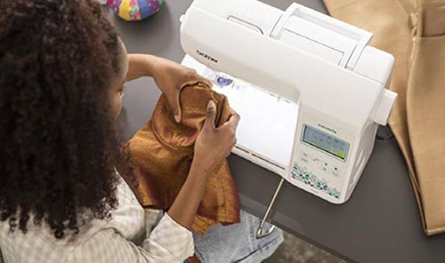 Genouillère de la machine à coudre Brother Innovis F560