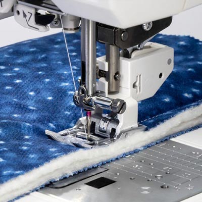 Système d'entraînement des tissus AcuFeed Flex - Janome Skyline S7 Edition anniversaire