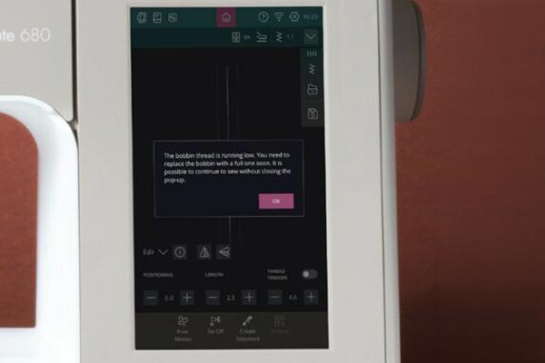 Enfile-aiguille automatique de la Pfaff Creative Elevate 680