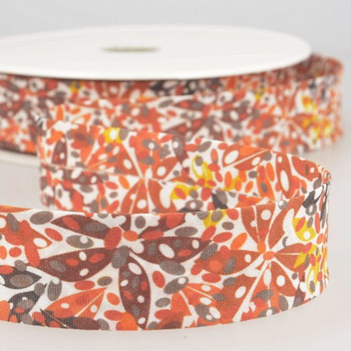 Biais imprimé feuilles tons rouilles /m Biais imprimé feuilles tons rouilles /m