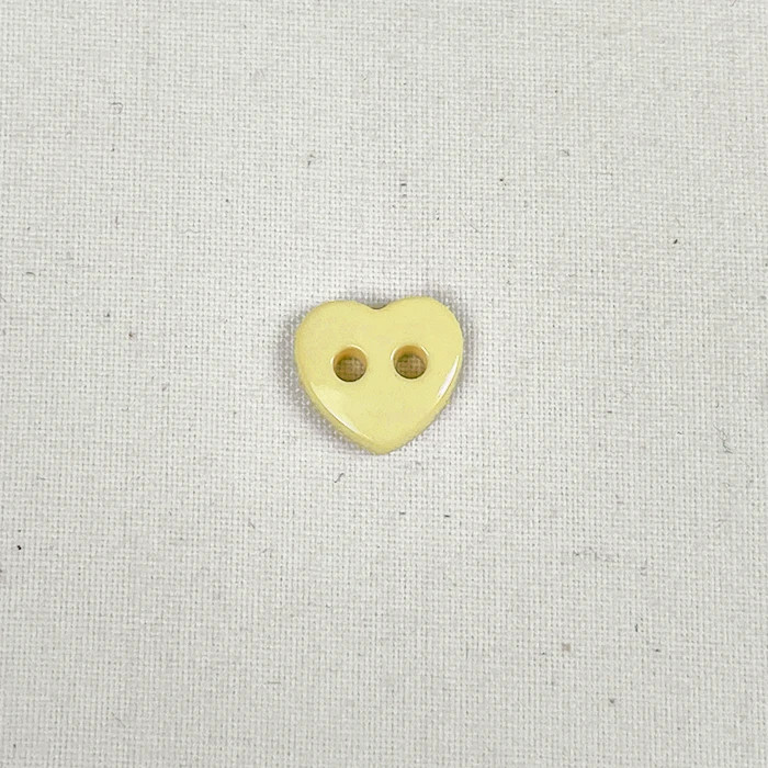 Bouton 12mm forme de coeur jaune uni Bouton 12mm forme de coeur jaune uni