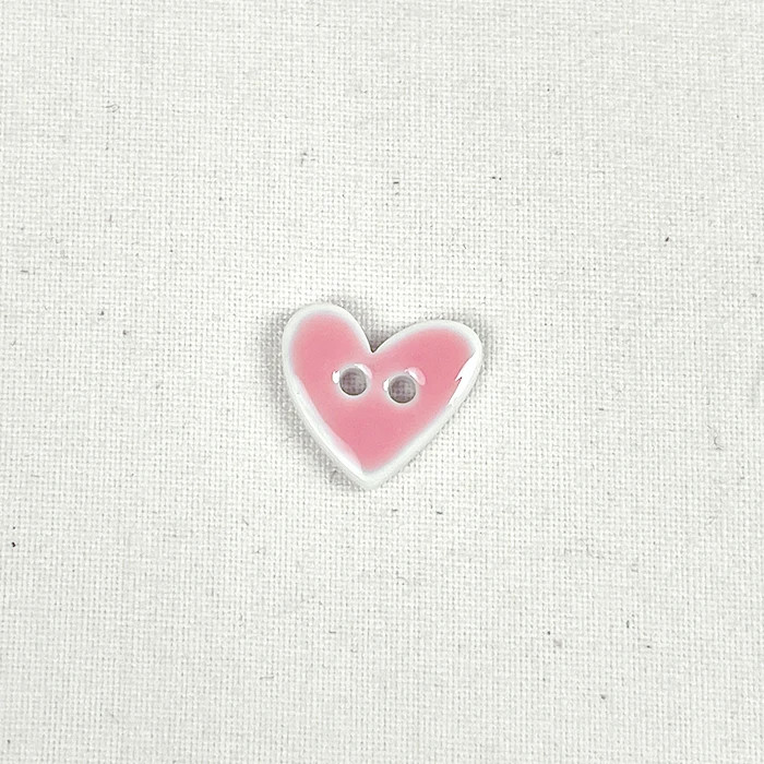 Bouton 15mm forme de coeur rose effet émail Bouton 15mm forme de coeur rose effet émail