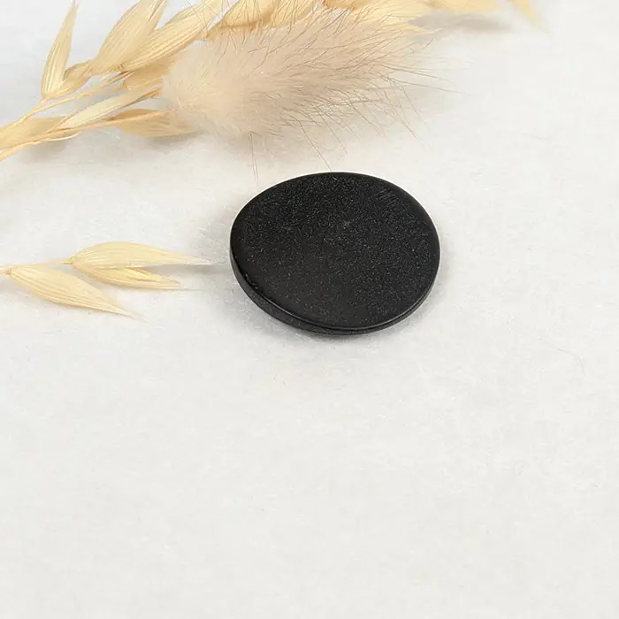 Bouton courbe noir 27mm Bouton courbe noir 27mm