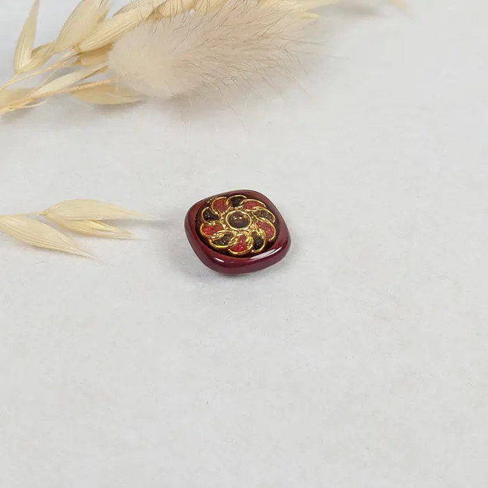 Bouton Fleur doré - bordeaux 15mm Bouton Fleur doré - bordeaux 15mm