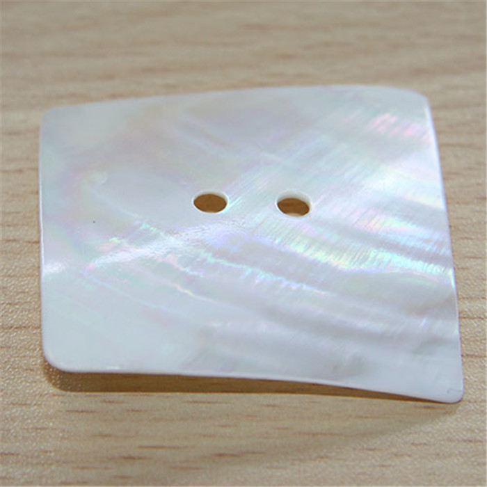Bouton incurvé nacré blanc 30mm Bouton incurvé nacré blanc 30mm