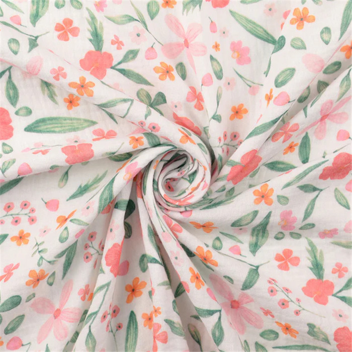 Tissu 100% coton double gaze fleurs fond blanc 140cm /50cm Tissu 100% coton double gaze fleurs fond blanc 140cm /50cm