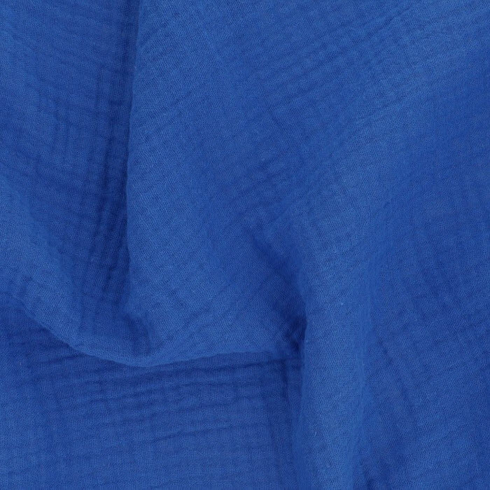 Tissu double gaze de coton bleu - Par 50cm Tissu double gaze de coton bleu - Par 50cm