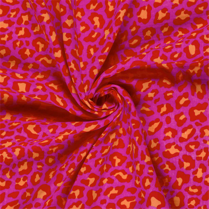 Tissu double gaze de coton rose léopard - Par 50cm Tissu double gaze de coton rose léopard - Par 50cm
