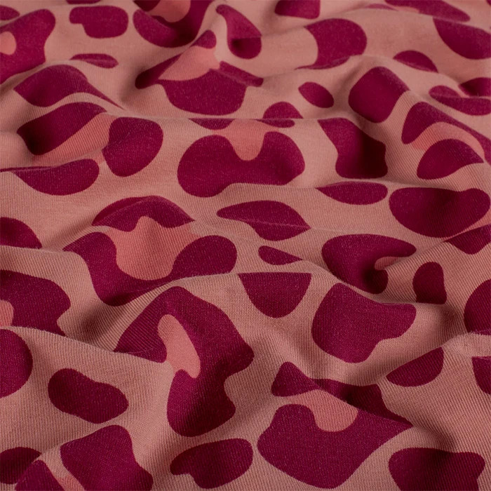 Tissu jersey de coton panthère vieux rose 150cm /50cm Tissu jersey de coton panthère vieux rose 150cm /50cm