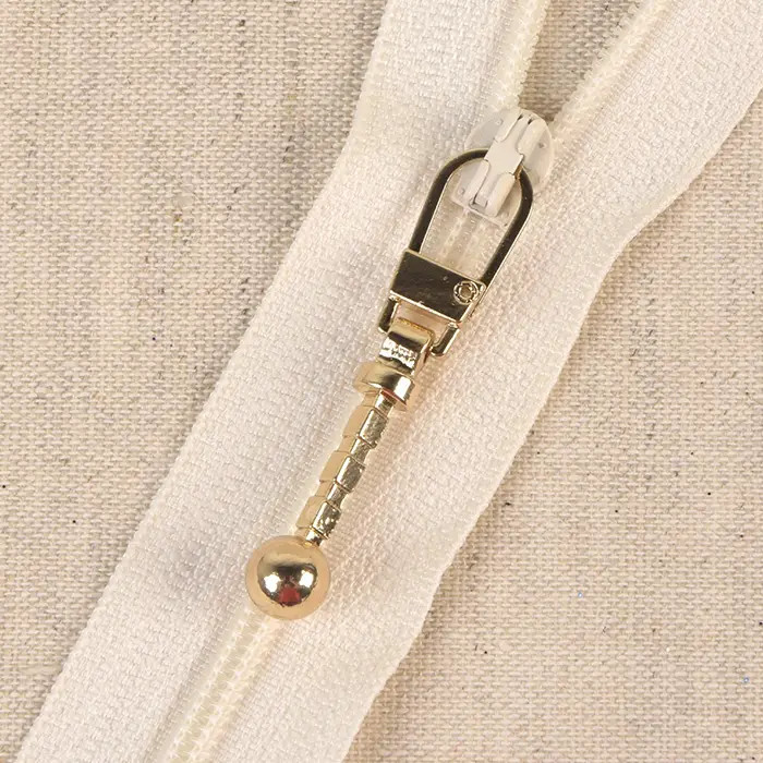 Zipper métal tirette fantaisie dorée Zipper métal tirette fantaisie dorée
